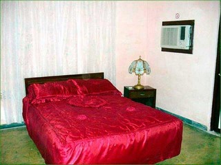 Habitacion doble con cama de matrimonio en el Apartamento Ileana