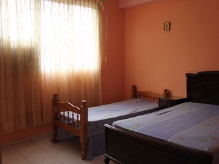 Habitacion doble con cama adicional en el Apartamento Osvaldo y Teresita